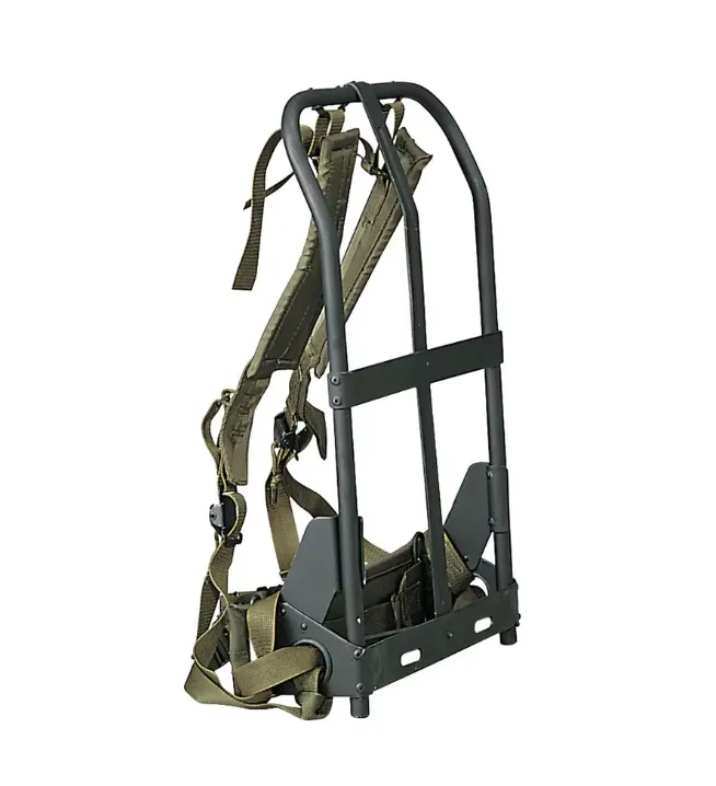 A side view of a military-style backpack frame with green straps and a black metal structure,